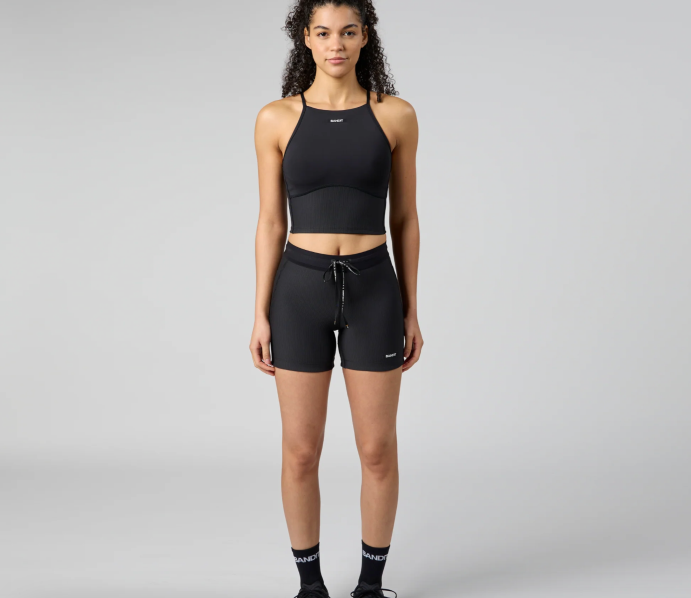 Bandit W Top Stamina™ 6 Pocket Nova Crop - Negro - Odda running