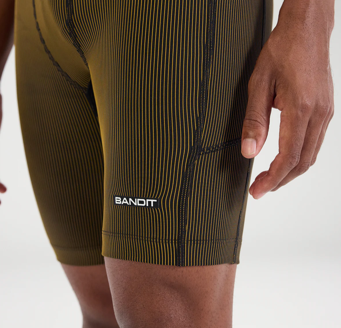 Bandit Shorts Striped Cadence™ 7 Pocket Half Tights - Negro / Dijon