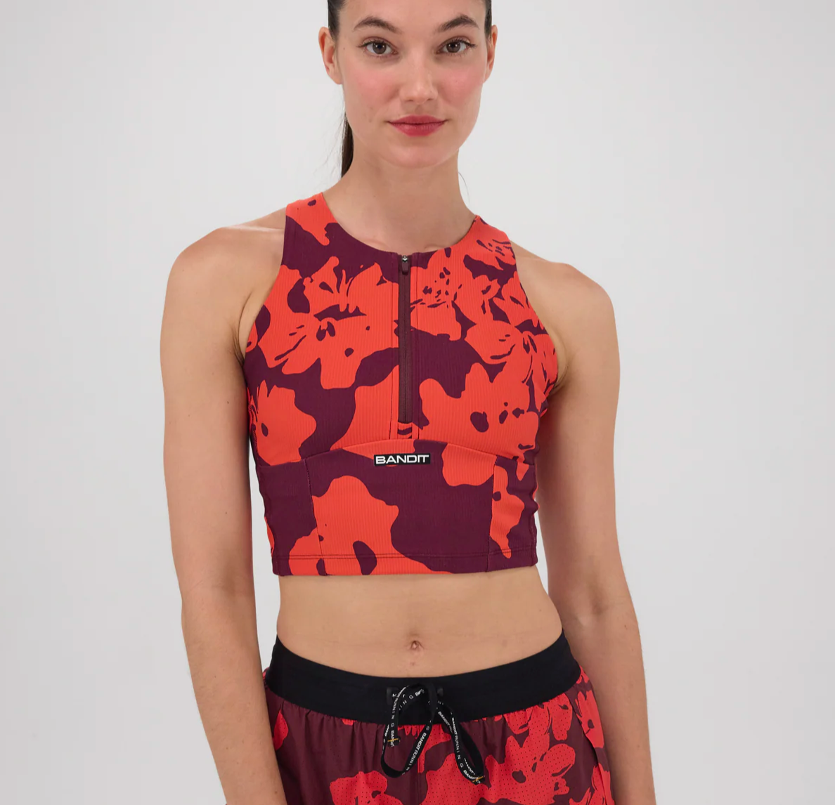 Bandit W Top Cadence Crop Zip - Floral / Rojo - Odda running