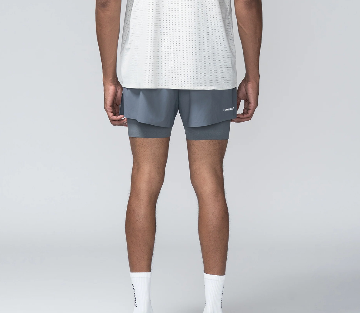 Hermanos Koumori Shorts - Azul - Odda running